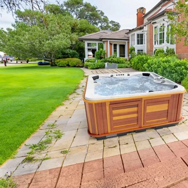 Arctic Spas Summit shown in a backyard setting
