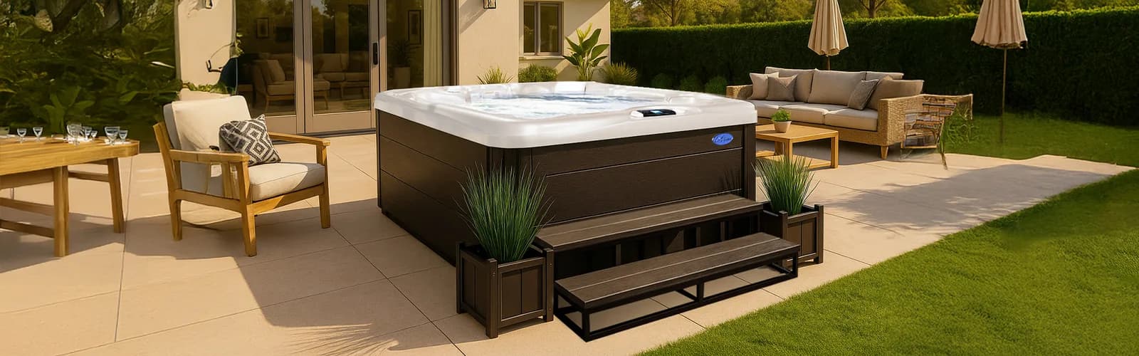 Cal Spas Escape hot tub with a dark cabinet and entry steps on a backyard patio