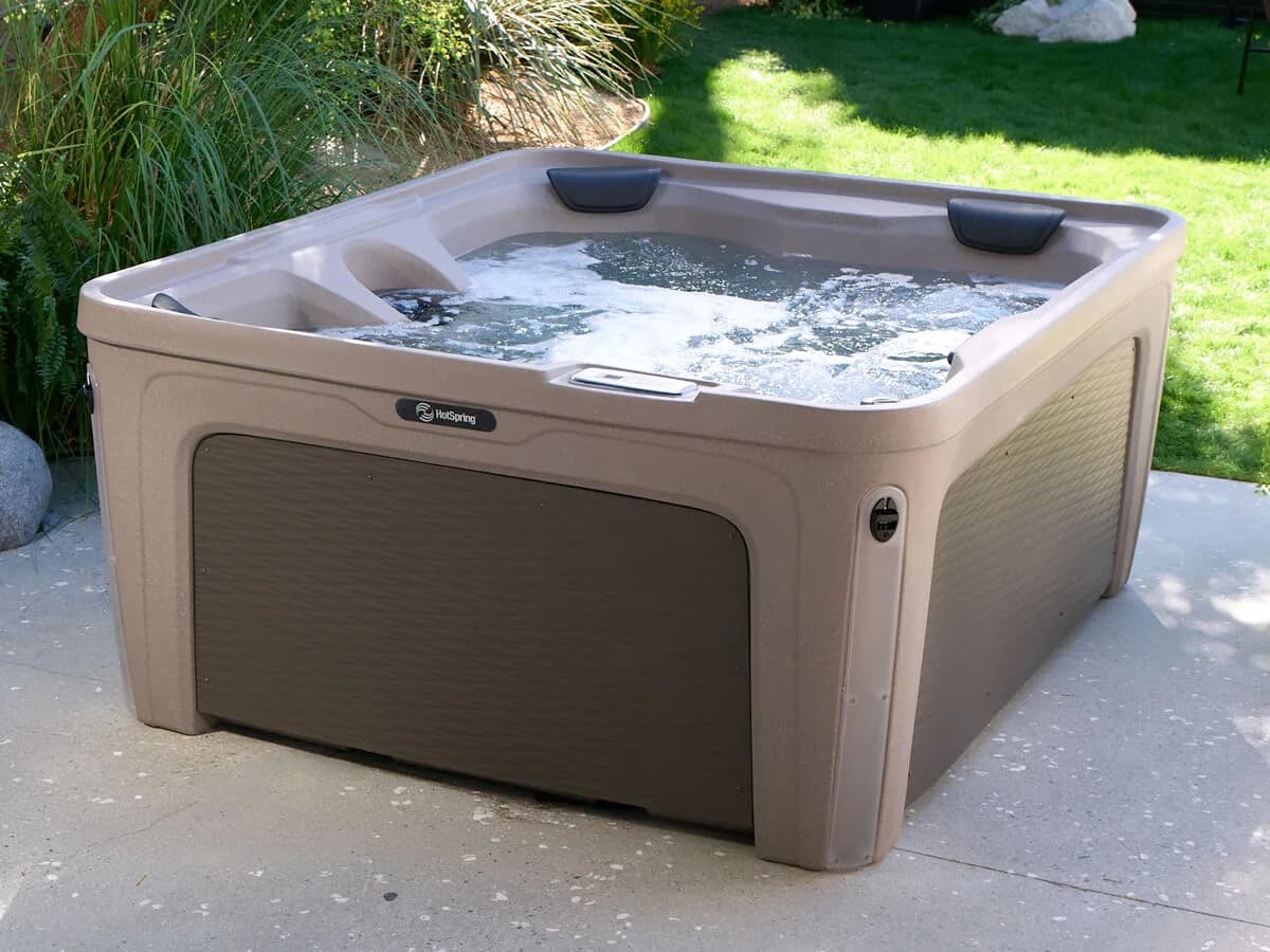 Freeflow Azure hot tub installed outdoors on a patio