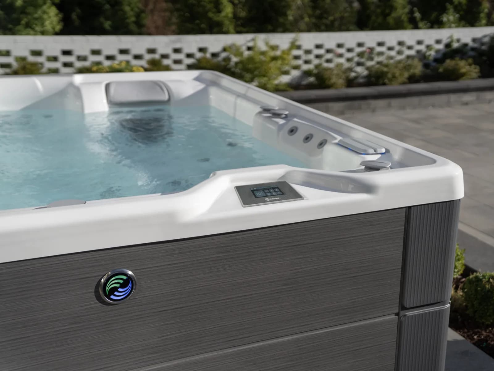 Hot Spring Highlife Aria hot tub in an outdoor lifestyle setting